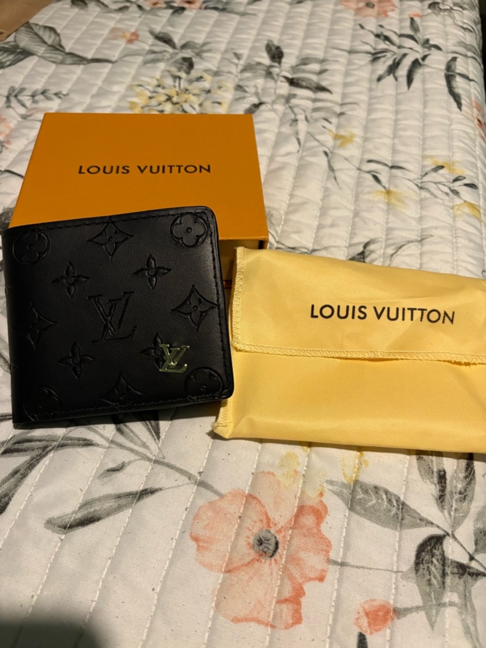 Louis Vuitton Black Monogram Embossed Bifold Wallet with Gold LV Accent